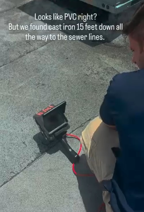 Sewer scope inspection revealing cast iron pipe 15 feet down